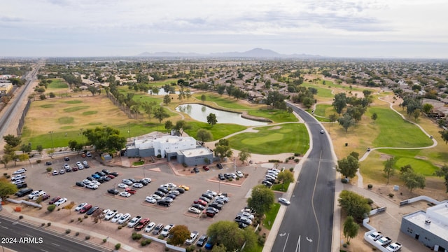 birds eye view of property with a mountain view