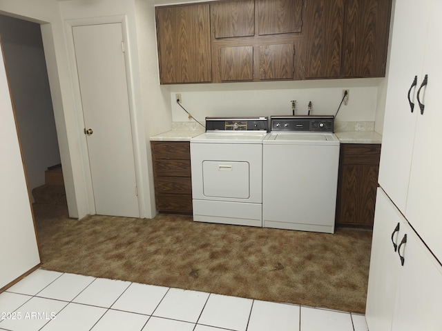 5463 E Roberts Dr, Globe, AZ 85501 - washroom featuring light carpet, cabinet space, and washer and clothes dryer