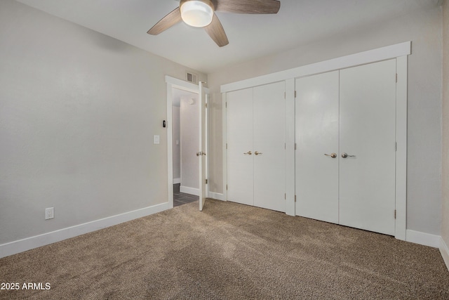 2228 E Campbell Ave Unit 116, Phoenix, AZ 85016 - unfurnished bedroom with ceiling fan, carpet, and two closets