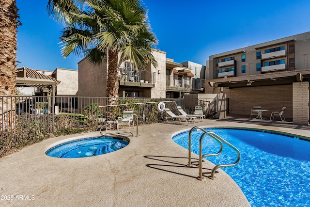 2228 E Campbell Ave Unit 116, Phoenix, AZ 85016 - view of swimming pool with a hot tub and a patio area