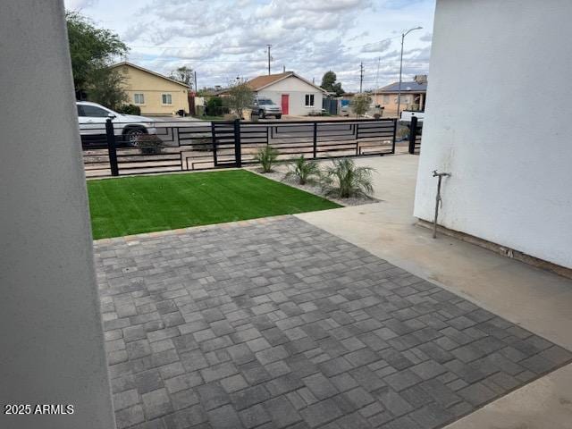 6633 N 54th Dr, Glendale, AZ 85301 - view of patio / terrace featuring a residential view and fence