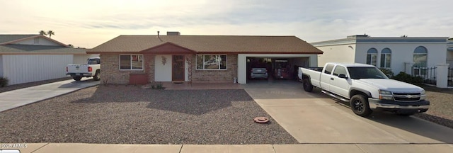 single story home featuring a garage