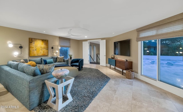 living room featuring ceiling fan