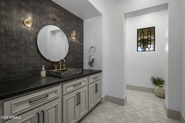 bathroom featuring backsplash and vanity