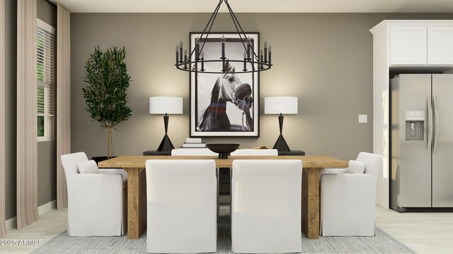 4808 S 232nd Ln, Buckeye, AZ 85326 - dining room with a chandelier and light wood finished floors