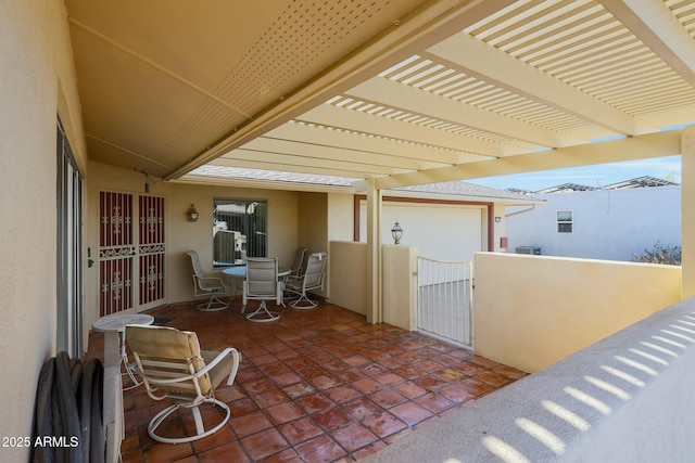 view of patio featuring a pergola