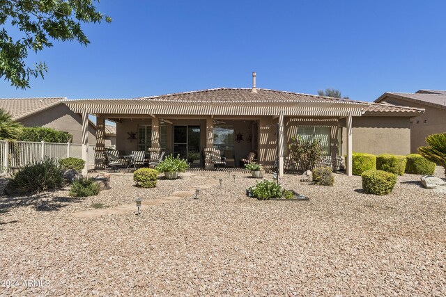 back of property featuring a patio area