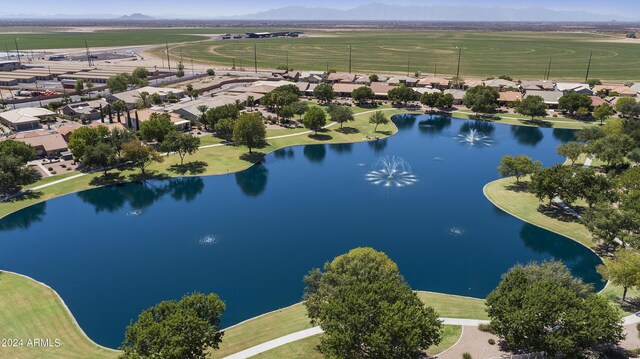 drone / aerial view with a water view and a rural view