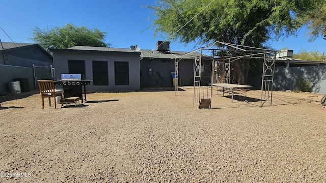 265 W 17th Ave, Apache Junction, AZ 85120 - back of property featuring stucco siding
