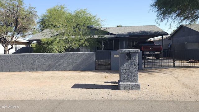 265 W 17th Ave, Apache Junction, AZ 85120 - view of front of house featuring a fenced front yard and a gate