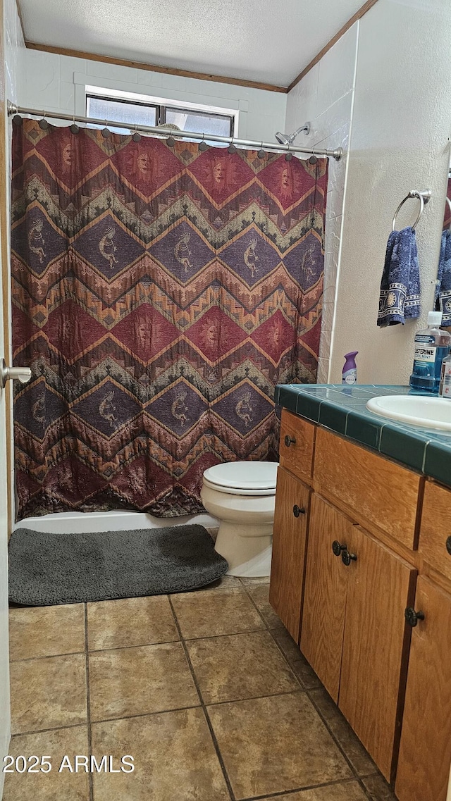 265 W 17th Ave, Apache Junction, AZ 85120 - full bathroom with vanity, a shower with curtain, a textured ceiling, and healthy amount of natural light