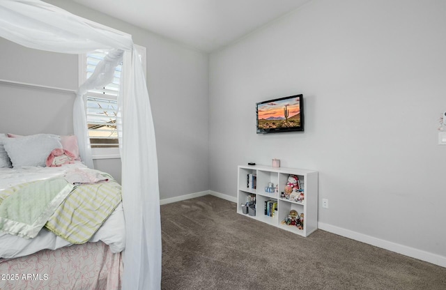 carpeted bedroom with baseboards