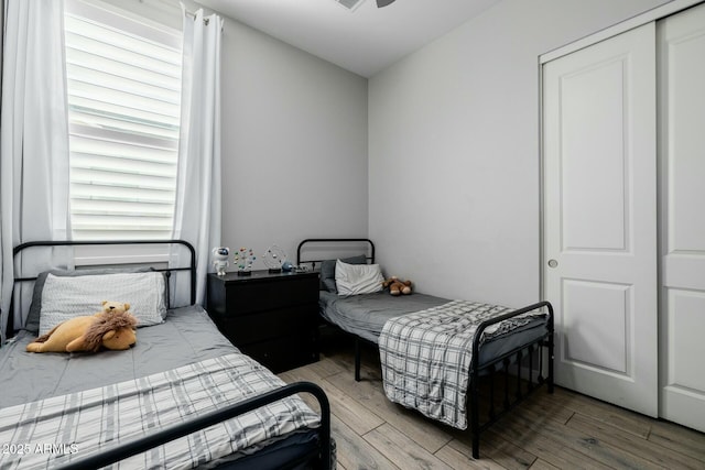 bedroom featuring wood finished floors