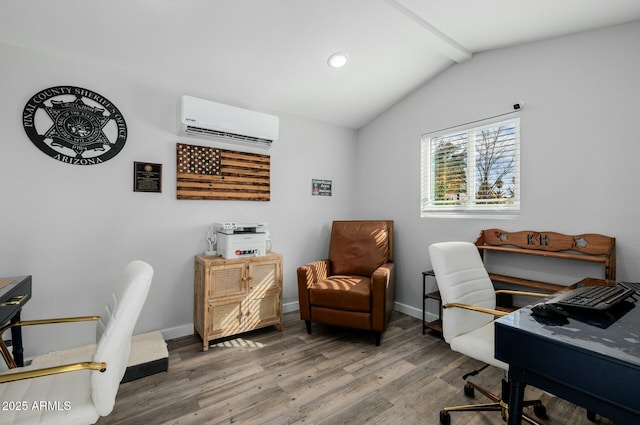 office space featuring a wall unit AC, lofted ceiling with beams, baseboards, and wood finished floors