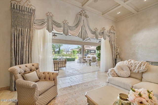 living room featuring beamed ceiling, ornamental molding, and coffered ceiling