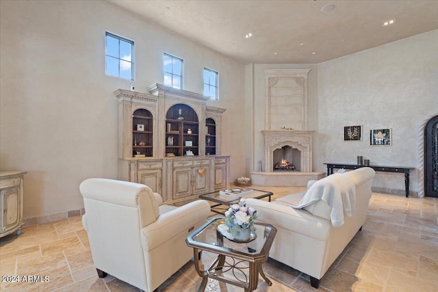 living room with a high ceiling