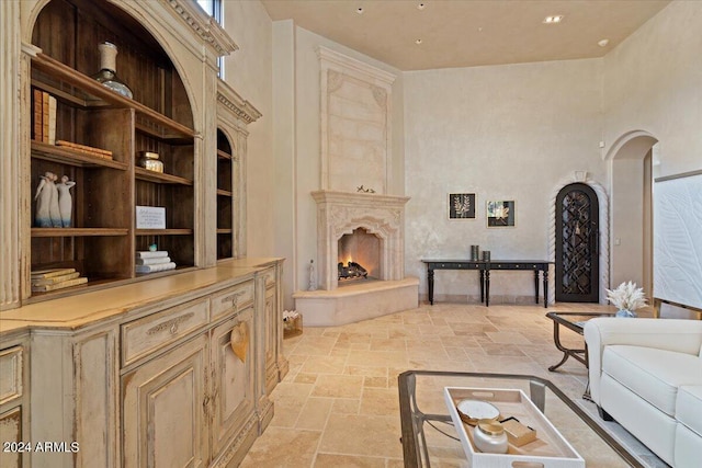 living room with a high ceiling