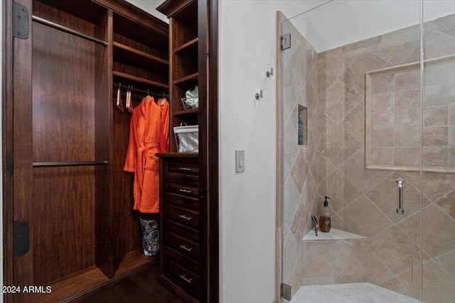 bathroom with an enclosed shower