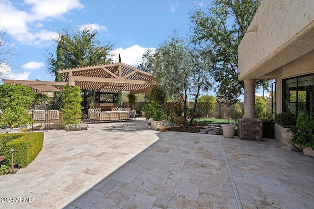 view of patio featuring a pergola