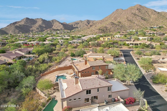 drone / aerial view featuring a mountain view