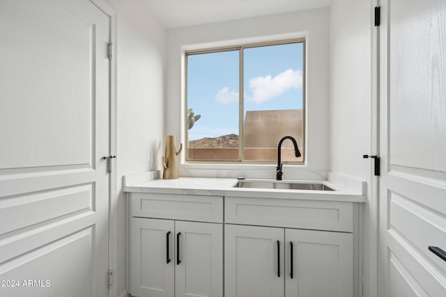 bathroom with a wealth of natural light and sink