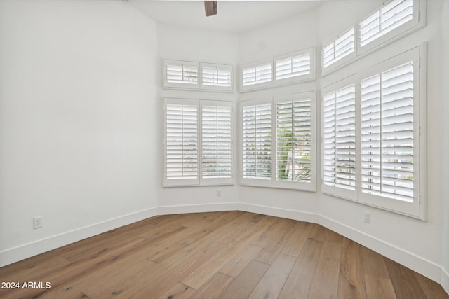 unfurnished room featuring light hardwood / wood-style floors