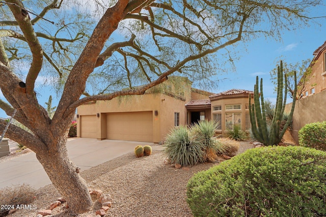 view of front of property featuring a garage