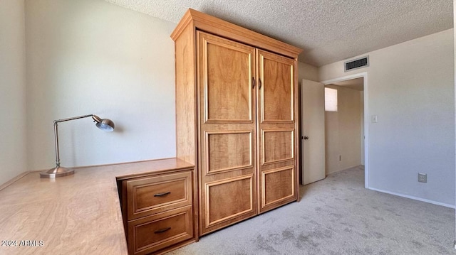 interior space with a textured ceiling