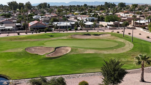 surrounding community with a mountain view