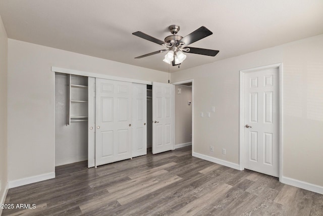 4901 S Calle Los Cerros Dr Unit 220, Tempe, AZ 85282 - unfurnished bedroom with wood finished floors, baseboards, a closet, and a ceiling fan