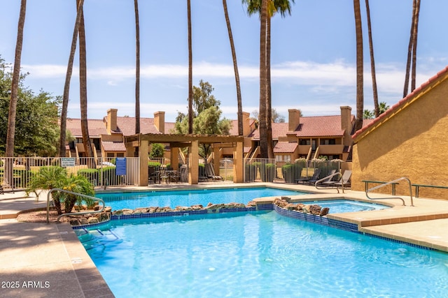 4901 S Calle Los Cerros Dr Unit 220, Tempe, AZ 85282 - view of pool with a pool with connected hot tub and a patio area