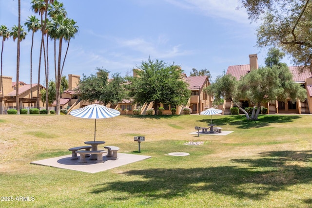 4901 S Calle Los Cerros Dr Unit 220, Tempe, AZ 85282 - view of community featuring stairs and a yard