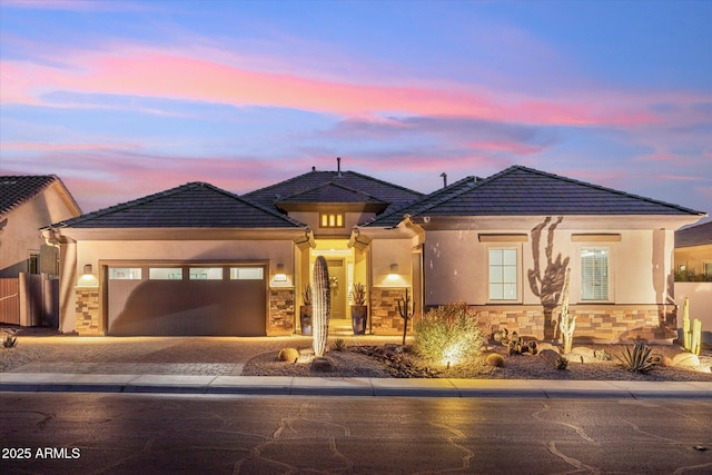 prairie-style home with a garage