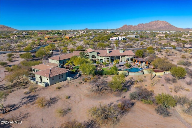 bird's eye view with a mountain view