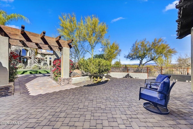 view of patio featuring a pergola