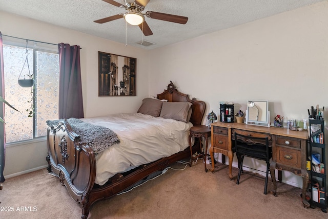 bedroom featuring baseboards, visible vents, a textured ceiling, and light colored carpet