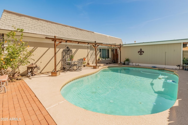 pool featuring a pergola and a patio