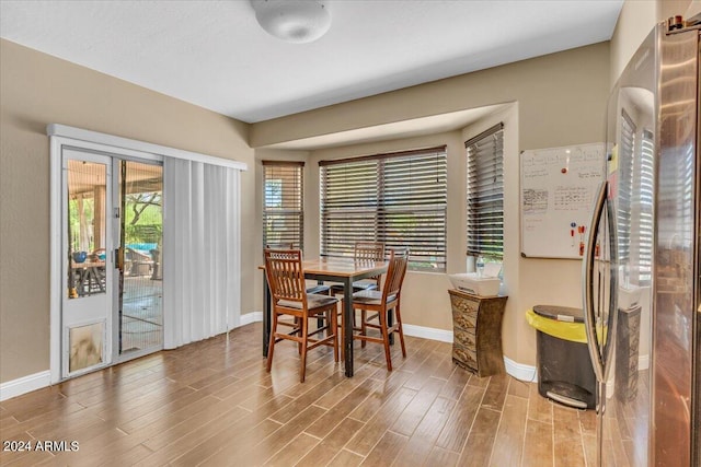 dining area featuring wood-type flooring