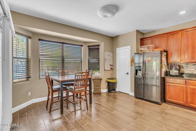 dining room with light hardwood / wood-style floors