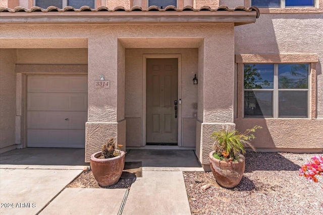 entrance to property with a garage