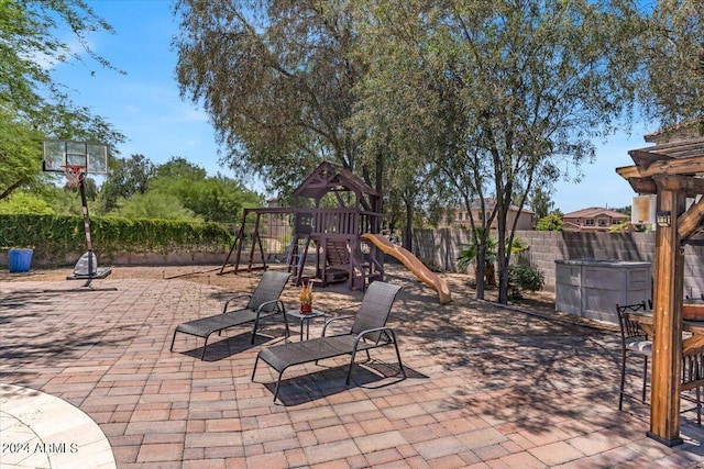 view of patio featuring a playground