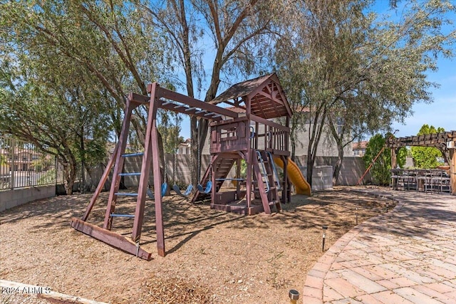 view of play area featuring a pergola