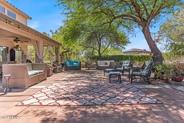 view of patio / terrace featuring ceiling fan and an outdoor hangout area