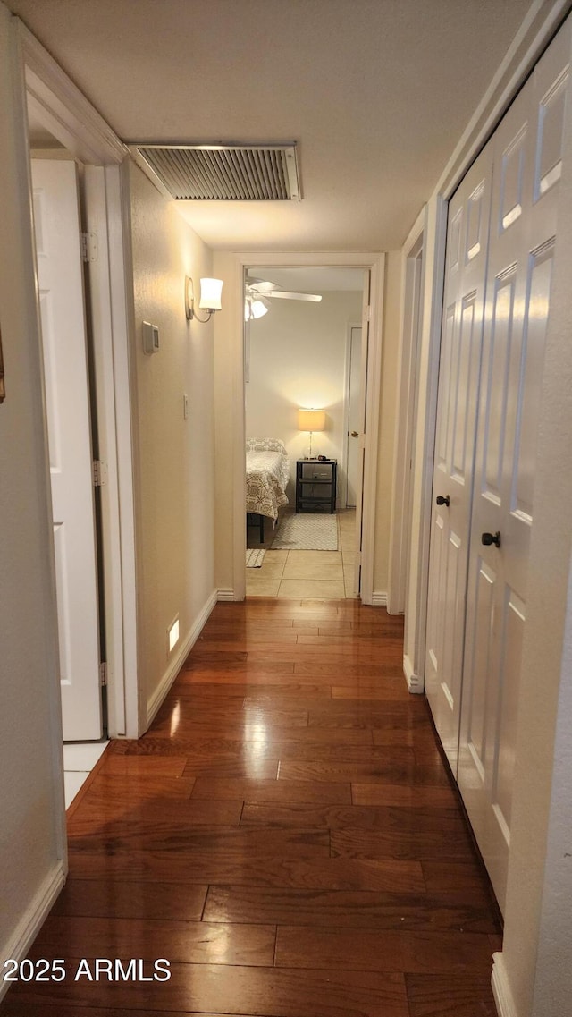 hall featuring dark hardwood / wood-style floors