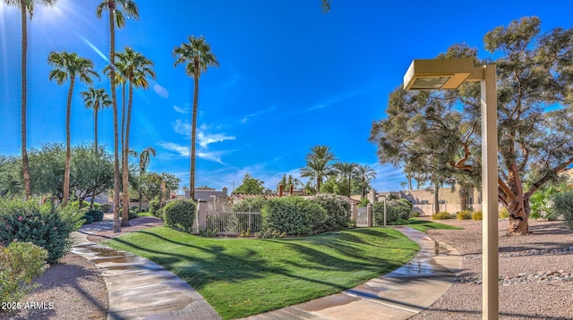 view of home's community featuring a lawn