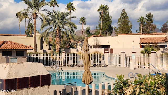 view of pool featuring a patio