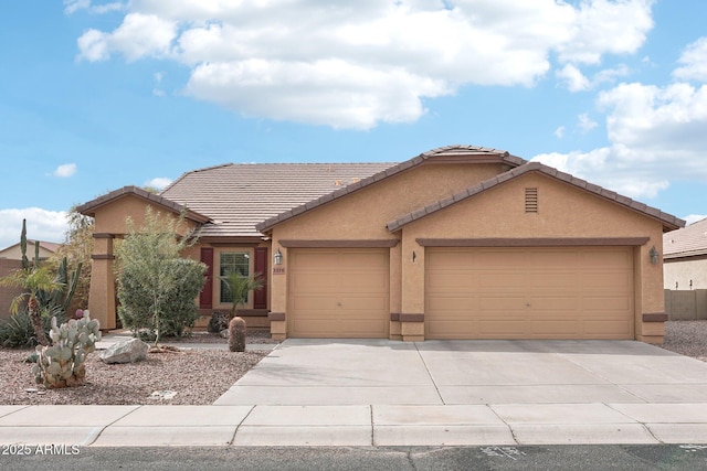 ranch-style house featuring a garage