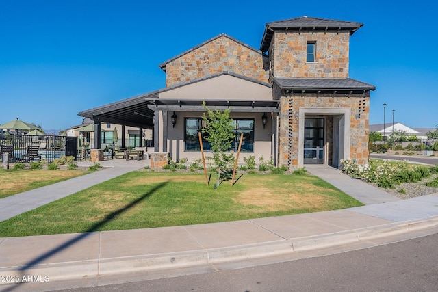 view of front of house with stone siding