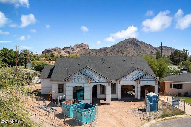 back of house featuring a mountain view