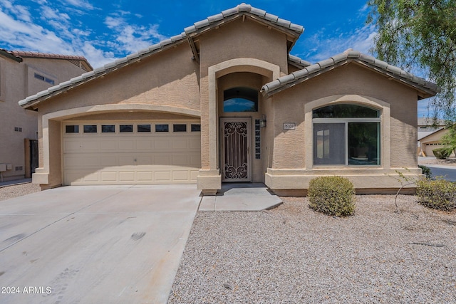 view of front of property featuring a garage